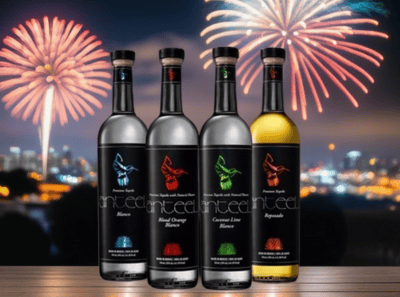 Anteel Tequila lined up with fireworks in the background.